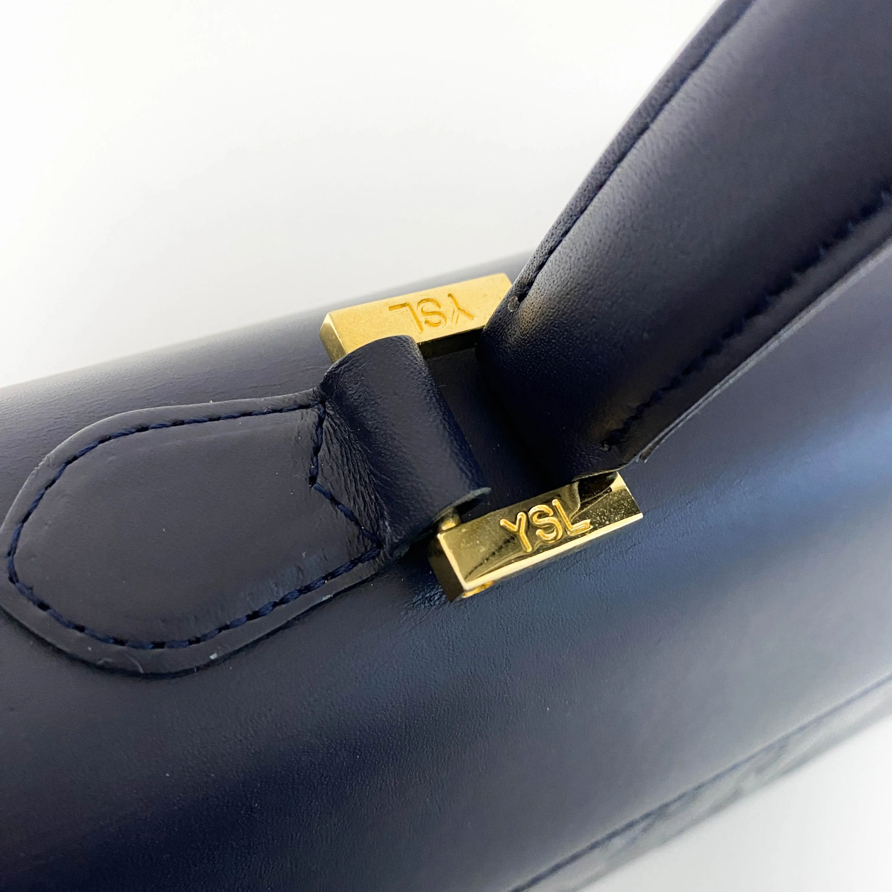 YSL Logo Embossed Leather Navy Horizontal Handbag